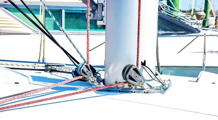 New Horizon Yacht Photos Pics Close-up of Beneteau Oceanis 45 sailboat rigging, 2018 model, featuring ropes and pulleys.