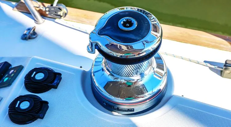 New Horizon Yacht Photos Pics Close-up of a winch on a 2018 Beneteau Oceanis 45 sailboat deck.
