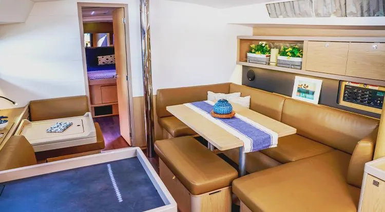 New Horizon Yacht Photos Pics Luxurious interior of 2018 Beneteau Oceanis 45 yacht with modern seating and decor.