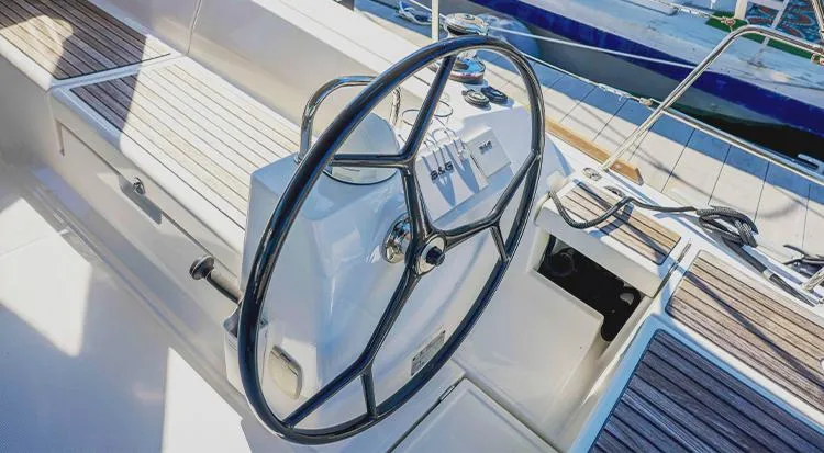 New Horizon Yacht Photos Pics Steering wheel of 2018 Beneteau Oceanis 45 yacht, docked at marina.