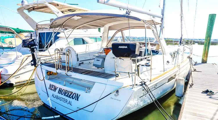 New Horizon Yacht Photos Pics 2018 Beneteau Oceanis 45 sailboat docked, featuring spacious deck and modern design.