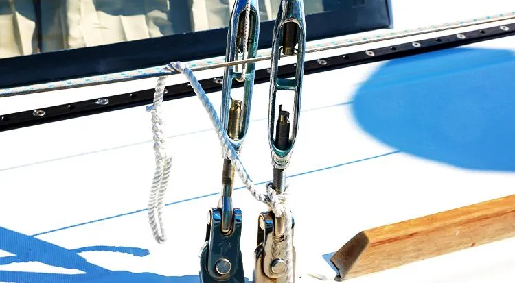 New Horizon Yacht Photos Pics Close-up of rigging on a 2018 Beneteau Oceanis 45 sailboat deck.