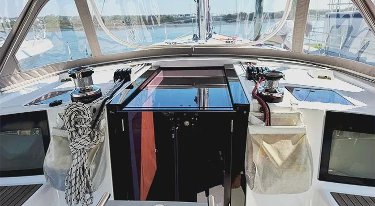 New Horizon Yacht Photos Pics Cockpit of 2018 Beneteau Oceanis 45 sailboat with winches and ropes.