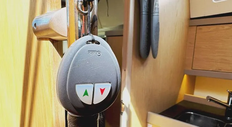 New Horizon Yacht Photos Pics Remote control hanging inside 2018 Beneteau Oceanis 45 yacht cabin.