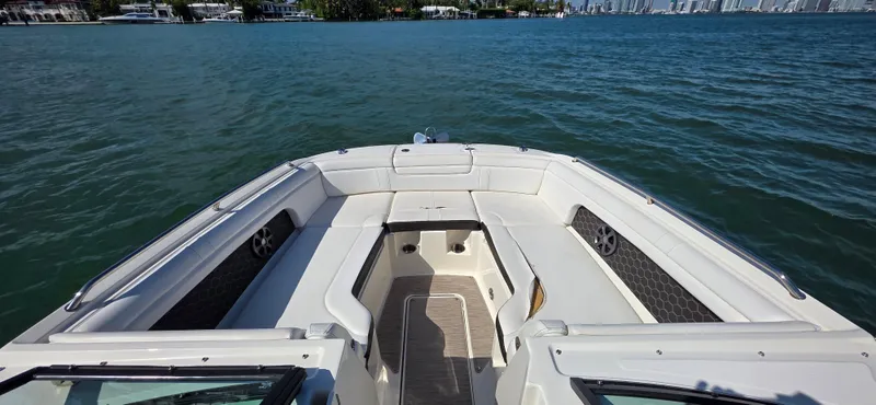  Yacht Photos Pics 2019 Sea Ray SDX 290 Outboard boat interior with spacious seating on calm water.