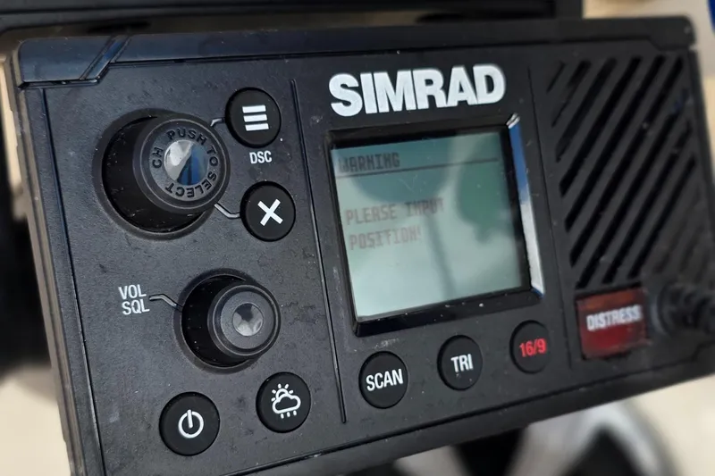  Yacht Photos Pics Simrad marine radio on 2019 Sea Ray SDX 290 Outboard boat dashboard.