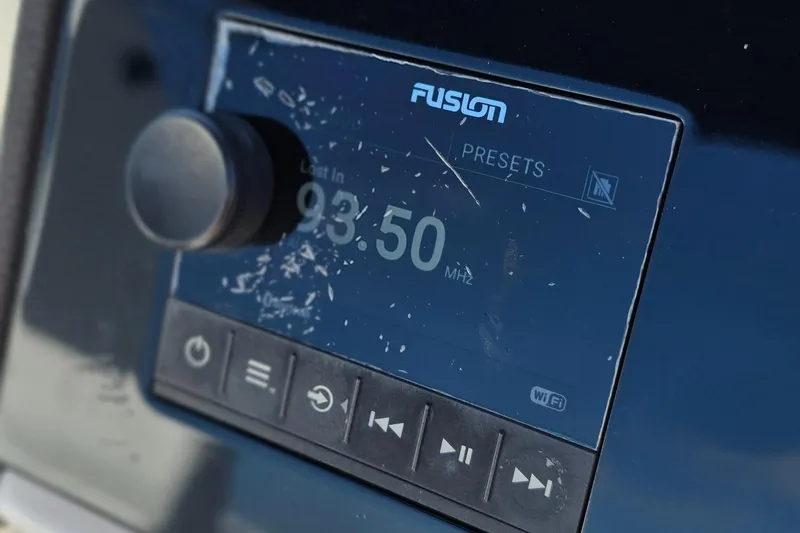  Yacht Photos Pics Fusion radio display on 2019 Sea Ray SDX 290 Outboard, tuned to 93.50 MHz.
