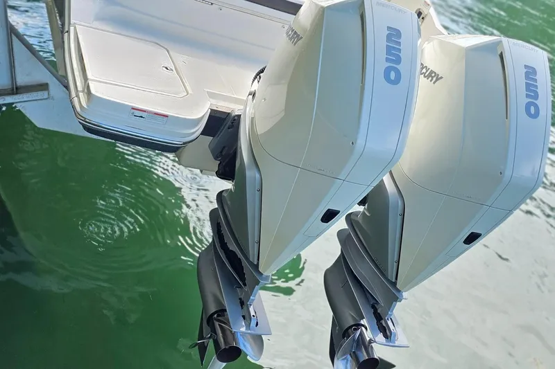  Yacht Photos Pics 2019 Sea Ray SDX 290 Outboard with twin Mercury engines on calm water.