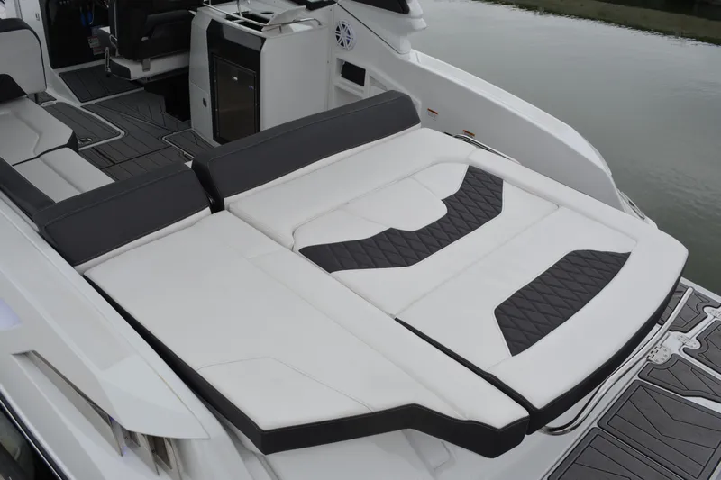  Yacht Photos Pics 2023 Monterey 305SS Super Sport boat with luxurious lounging area.