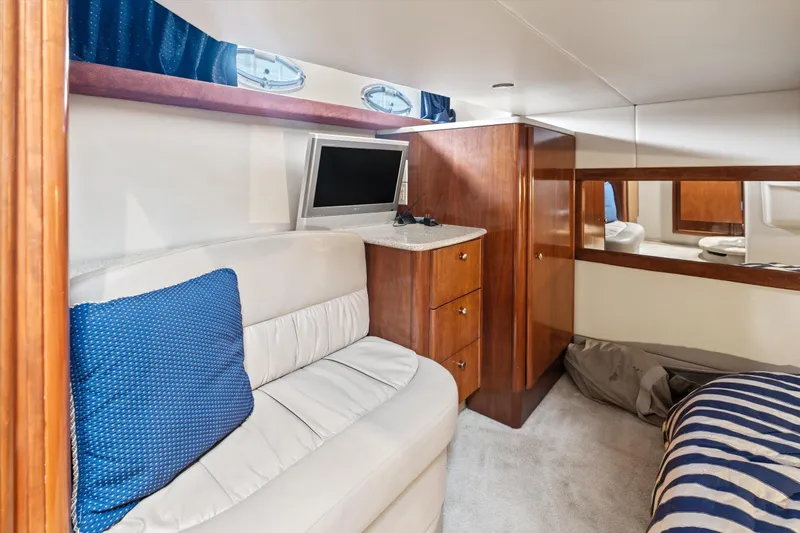 Barbarrick Yacht Photos Pics Luxurious interior of 2006 Meridian 411 Sedan with cozy seating and modern amenities.