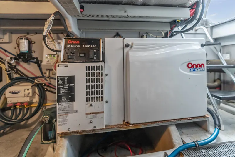 Barbarrick Yacht Photos Pics Engine room of 2006 Meridian 411 Sedan with Onan marine generator.