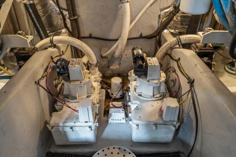 Barbarrick Yacht Photos Pics Engine room of a 2006 Meridian 411 Sedan with mechanical components and wiring.