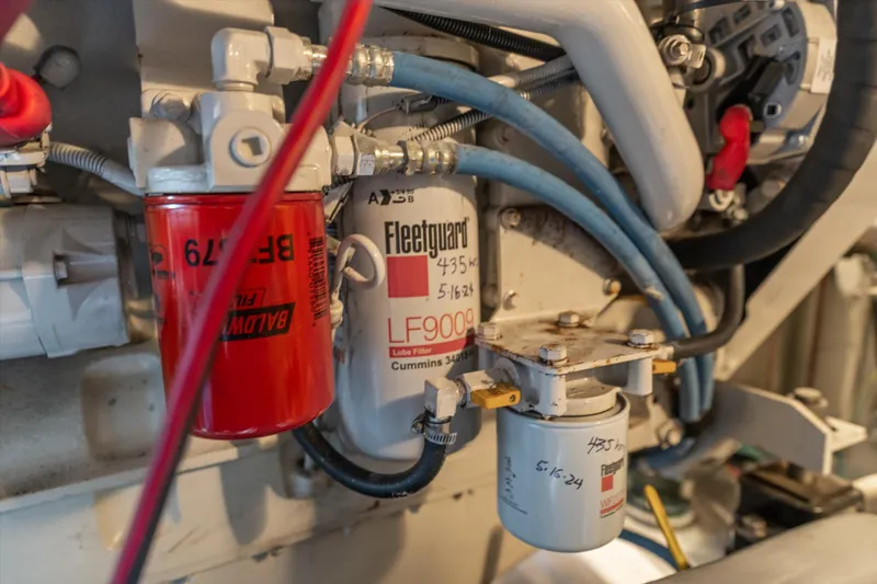 Barbarrick Yacht Photos Pics Engine components of a 2006 Meridian 411 Sedan, featuring filters and hoses.