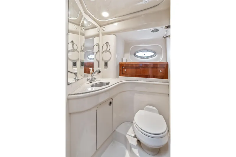 Barbarrick Yacht Photos Pics Luxurious bathroom in 2006 Meridian 411 Sedan yacht, featuring modern fixtures and elegant design.