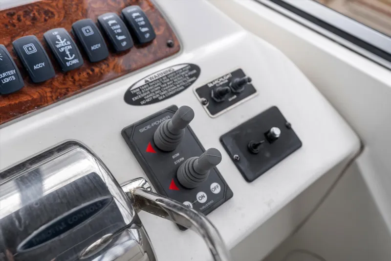 Barbarrick Yacht Photos Pics Control panel of 2006 Meridian 411 Sedan boat with switches and levers.