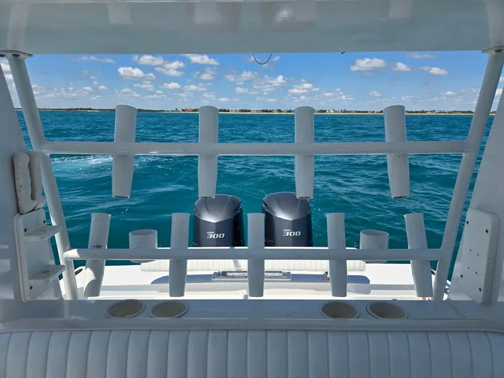  Yacht Photos Pics 2012 Contender Custom 33 Center Console boat with dual 300 engines on open water.