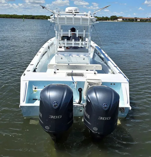  Yacht Photos Pics 2012 Contender Custom 33 Center Console boat with twin Yamaha 300 engines on the water.