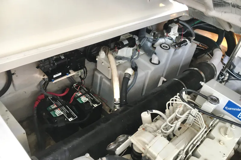  Yacht Photos Pics Engine compartment of 2005 Sea Ray 420 Sundancer with batteries and Cummins components.