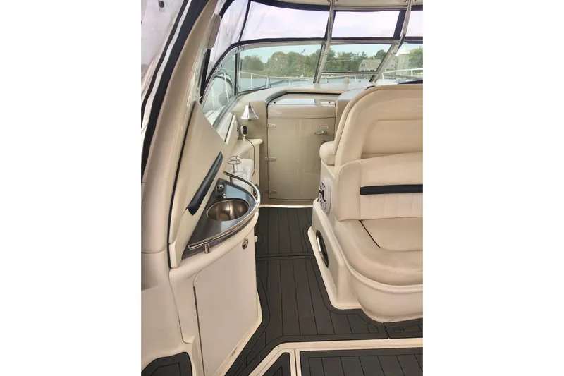  Yacht Photos Pics 2005 Sea Ray 420 Sundancer interior with beige seating and sleek design.