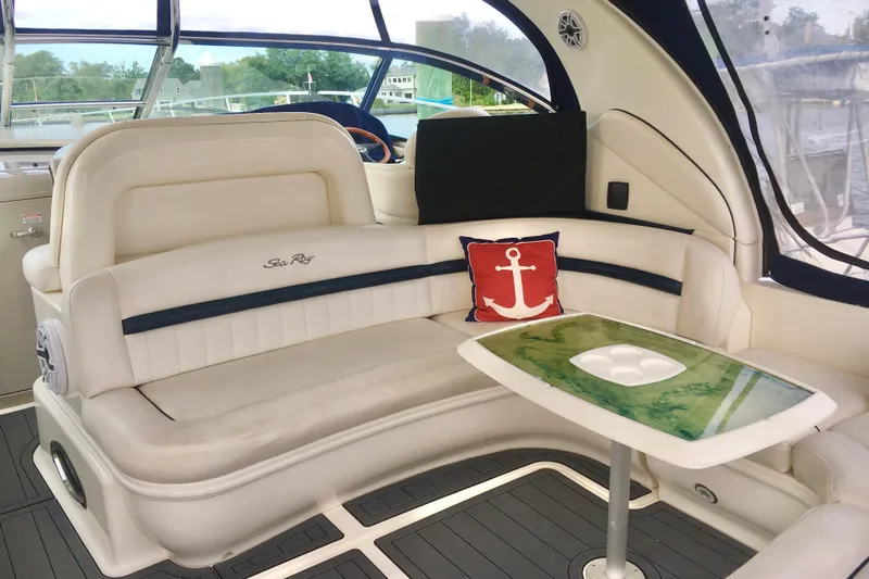  Yacht Photos Pics Luxurious 2005 Sea Ray 420 Sundancer interior with plush seating and nautical decor.