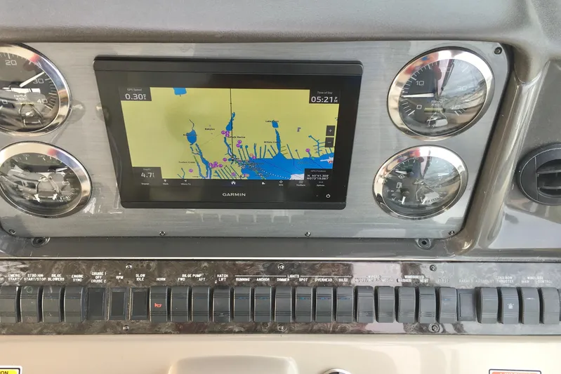  Yacht Photos Pics Dashboard of 2005 Sea Ray 420 Sundancer with Garmin navigation display and gauges.