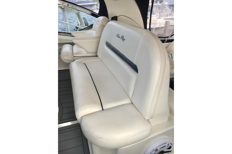  Yacht Photos Pics Luxurious seating on 2005 Sea Ray 420 Sundancer yacht, featuring elegant white upholstery.