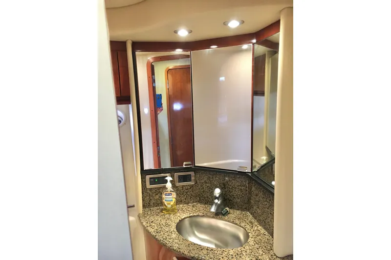  Yacht Photos Pics Luxurious bathroom interior of 2005 Sea Ray 420 Sundancer yacht with granite countertop.