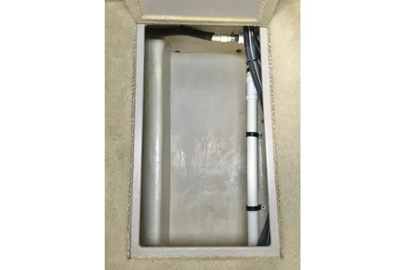  Yacht Photos Pics 2005 Sea Ray 420 Sundancer interior compartment with visible wiring and piping.