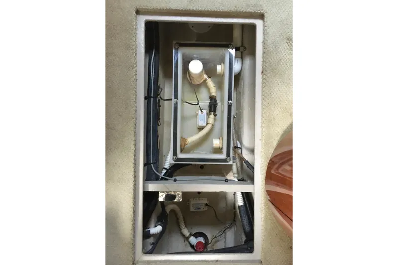  Yacht Photos Pics 2005 Sea Ray 420 Sundancer bilge compartment with visible plumbing and wiring.