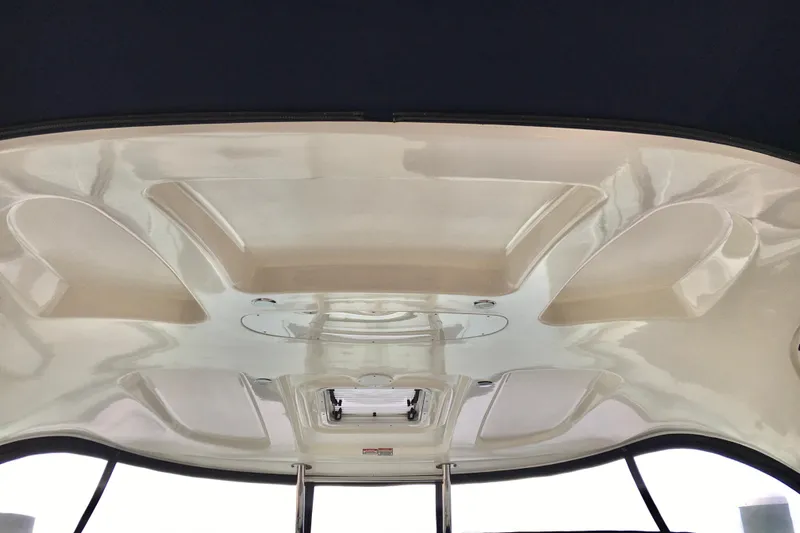  Yacht Photos Pics Ceiling view of 2005 Sea Ray 420 Sundancer boat interior, featuring sleek design elements.