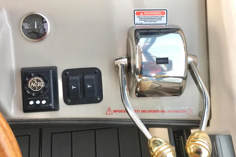  Yacht Photos Pics Control panel of a 2005 Sea Ray 420 Sundancer boat with throttle and switches.
