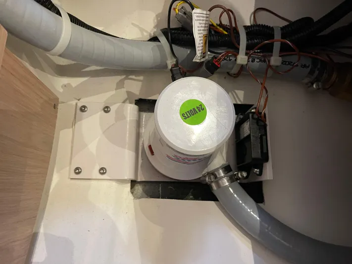  Yacht Photos Pics Engine compartment of 2022 Beneteau Monte Carlo 52 with visible wiring and components.