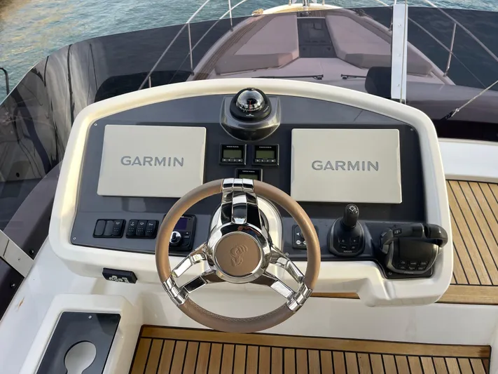  Yacht Photos Pics Cockpit of 2022 Beneteau Monte Carlo 52 with Garmin navigation systems.