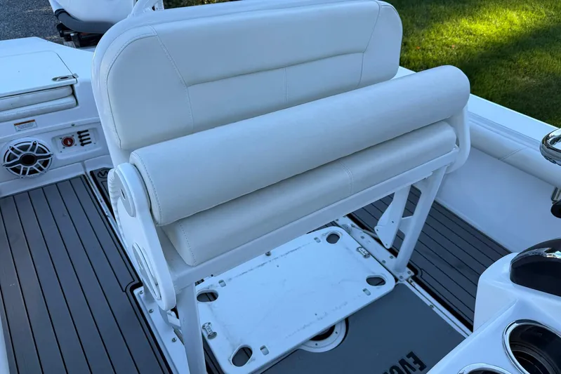  Yacht Photos Pics 2023 Everglades 243 Center Console boat interior with white seating and deck details.