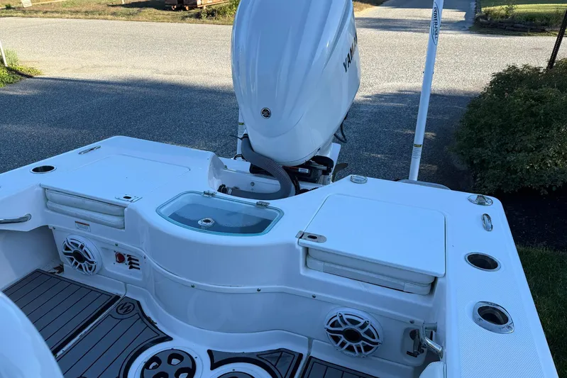  Yacht Photos Pics 2023 Everglades 243 Center Console boat with Yamaha engine, featuring a sleek deck design.