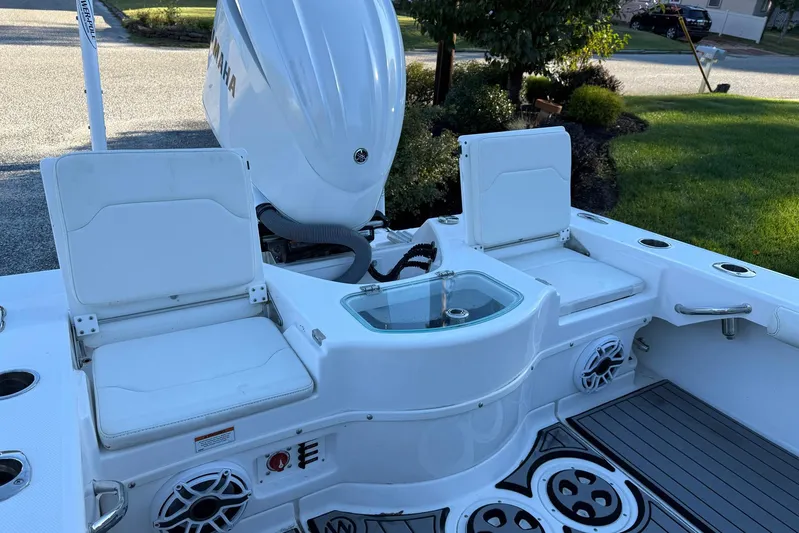  Yacht Photos Pics 2023 Everglades 243 Center Console boat interior with seating and Yamaha engine.