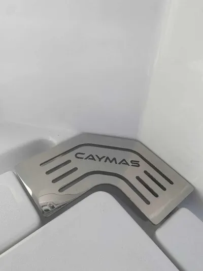 Cat Outta Hell Yacht Photos Pics Caymas 34 CT 2025 logo on metallic surface, sleek design detail.