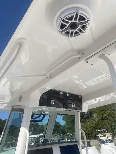 Black Label Marine Yacht Photos Pics 2025 Caymas 34 CT boat interior with speaker and control panel.