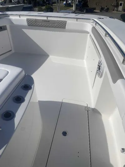 Cat Outta Hell Yacht Photos Pics 2025 Caymas 34 CT boat interior, featuring sleek white deck and seating area.