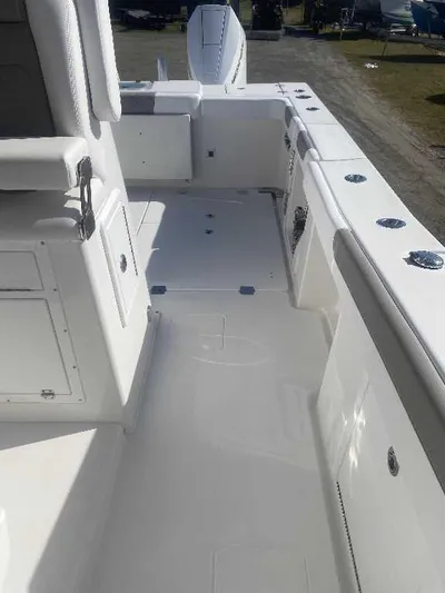 Black Label Marine Yacht Photos Pics 2025 Caymas 34 CT boat deck, featuring spacious seating and storage compartments.