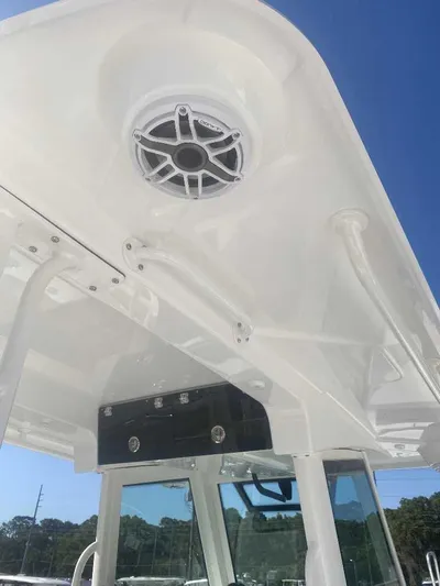 Cat Outta Hell Yacht Photos Pics 2025 Caymas 34 CT boat roof with speaker and blue sky background.