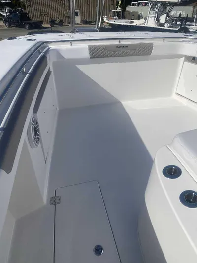 Cat Outta Hell Yacht Photos Pics 2025 Caymas 34 CT boat interior, featuring sleek white design and modern amenities.
