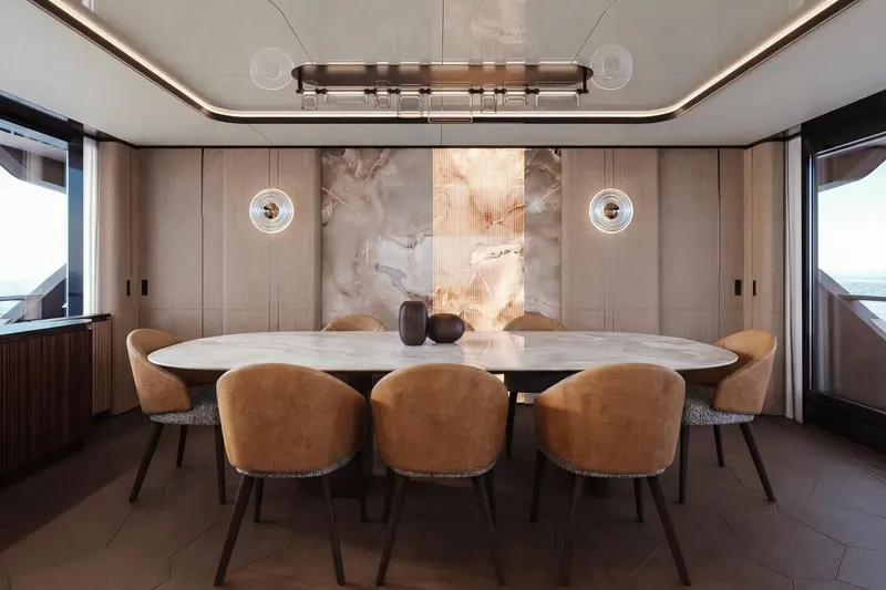  Yacht Photos Pics Luxurious dining area on 2027 Cantieri di Pisa Custom 112 yacht, featuring elegant decor and seating.