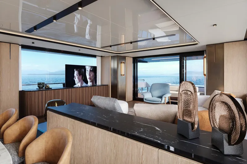  Yacht Photos Pics Luxurious interior of 2027 Cantieri di Pisa Custom 112 yacht with ocean view.
