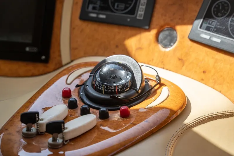 Richmind Yacht Photos Pics Compass and controls on 2007 Azimut 68E yacht dashboard.