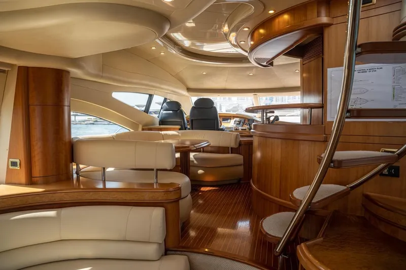 Richmind Yacht Photos Pics Luxurious interior of 2007 Azimut 68E yacht with elegant wood and leather finishes.