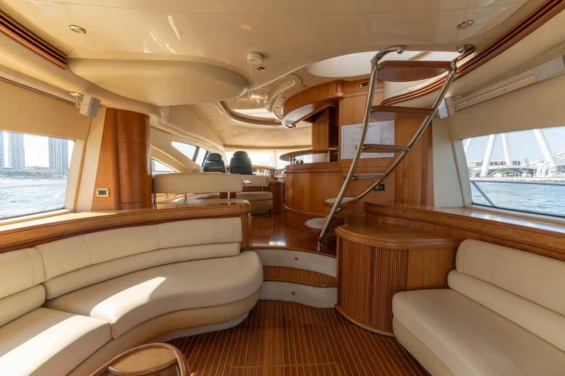 Richmind Yacht Photos Pics Luxurious interior of 2007 Azimut 68E yacht with elegant wood and leather furnishings.