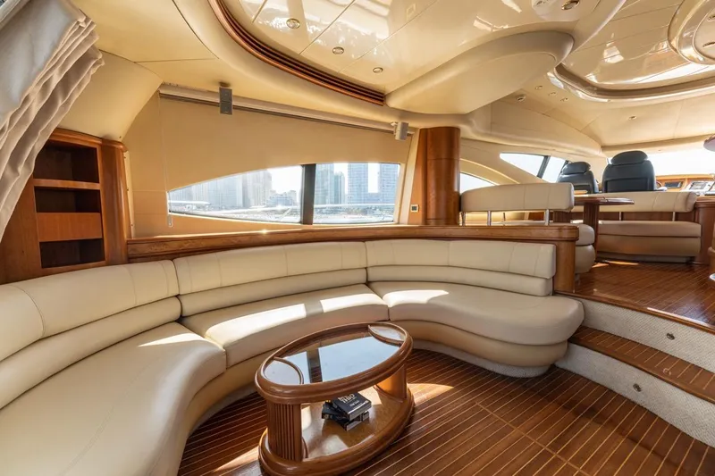 Richmind Yacht Photos Pics Luxurious interior of a 2007 Azimut 68E yacht with elegant seating and wood finishes.