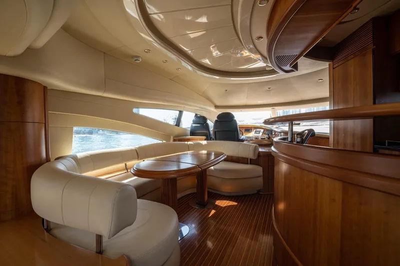 Richmind Yacht Photos Pics Luxurious interior of a 2007 Azimut 68E yacht with elegant wood and leather finishes.
