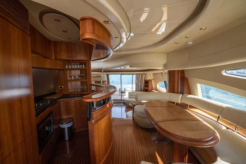 Richmind Yacht Photos Pics Luxurious interior of a 2007 Azimut 68E yacht with elegant wood finishes.